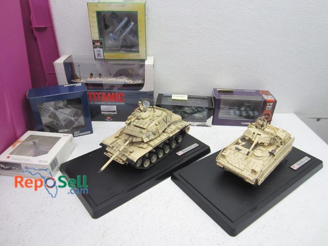 Lot 31-9199 - Lot Of Model Military Vehicles: Model Collect, Titanic, Tanks etc - Bring Tote