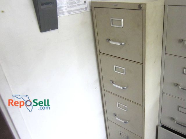 Lot 31-1315 - (1) Staples 52" H Four-Drawer Vertical Filing Cabinet, Metal Construction