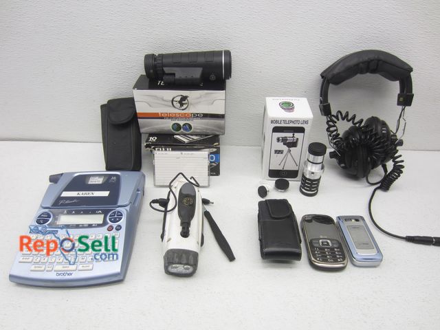 Lot 31-9467 - Estate Lot: Small Telescope, Phones, Brother P-Touch, Headphones, etc.