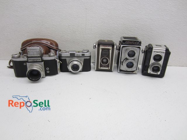Lot 31-8612 - Camera Lot: (1) Praktica FX2 w/Case, (1) IIoca Rapid-B, (1) Kodak Duaflex IV, (1) Kenflex, (1) Argus...