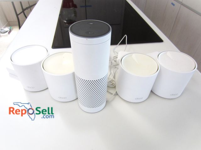 Lot 31-1505 - Electronics Lot: (4) Deco TP Link Wi-Fi Routers And Amazon Echo Dot Smart Speaker #CE0984