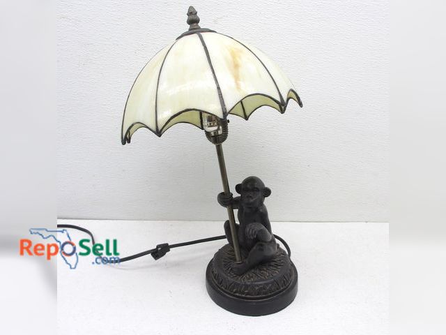 Lot 31-9098 - Small Monkey Lamp - Toggle needs repair