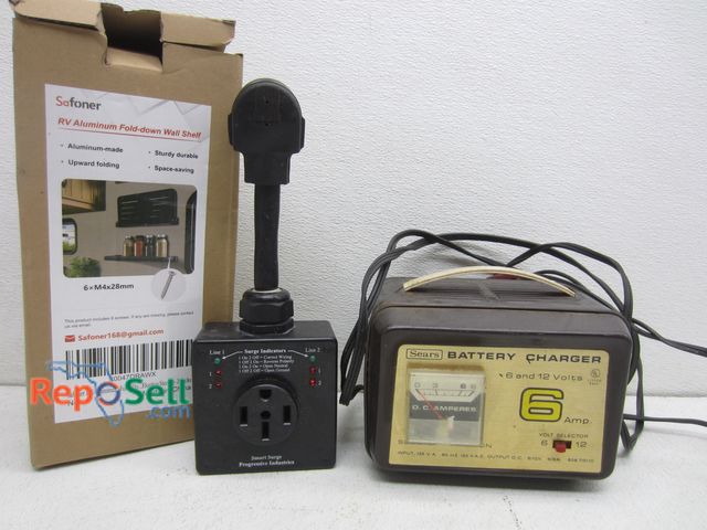 Lot 31-3363 - RV Smart Surge Protector, Folding Aluminum Shelf And Battery Charger