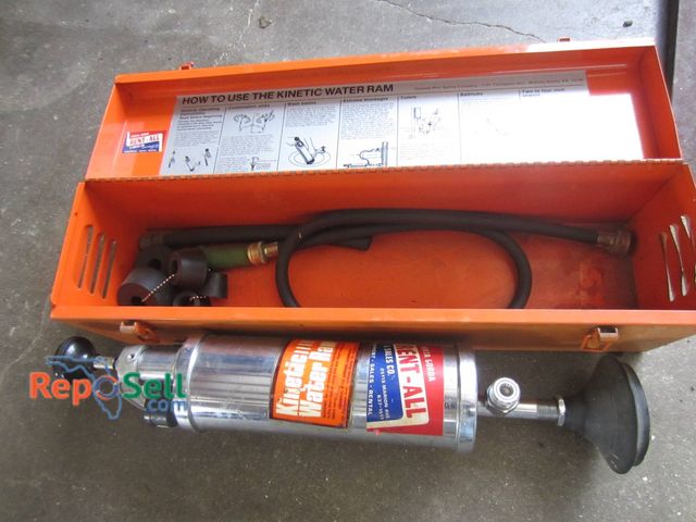 Lot 31-1355 - General Wire Kinetic Water Ram with orange carrying case and accessories. Designed for clearing clog...
