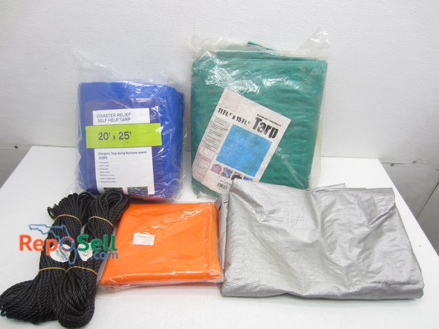 Lot 31-9339 - (2) New Tarps, Parachute Cord, Griddle Mat, etc.