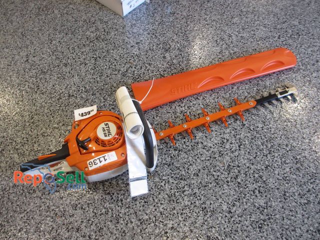 Lot 31-1136 - New Stihl HS 56 Hedge Trimmer featuring an orange and silver finish. Designed for hedge maintenance ...