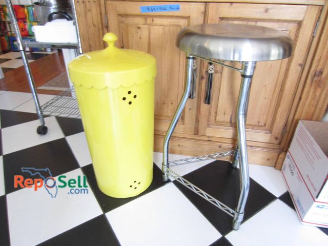 Lot 31-9173 - Yellow metal trash bin with perforated ventilation holes and a domed lid, measuring approximately 24...