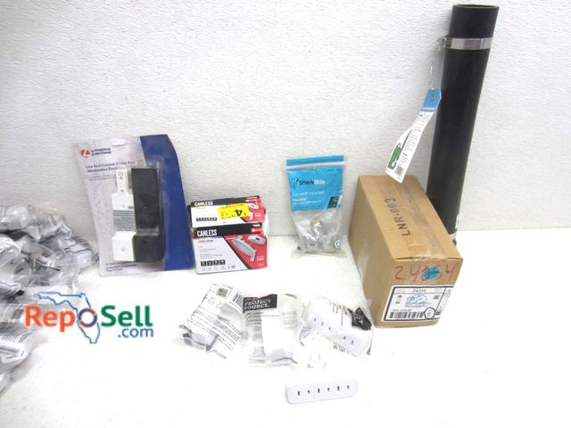 Lot 31-9124 - Plumbing and electrical accessories: Shark Bite, galvanized nipple, (17) 3-outlet adapters, etc. - s...