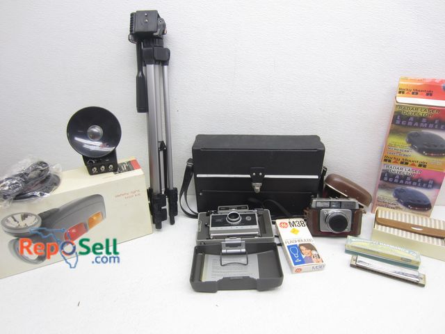 Lot 31-3174 - Estate Lot: (2) Vintage Cameras, Harmonica, (2) Laser Radar Detectors, etc.