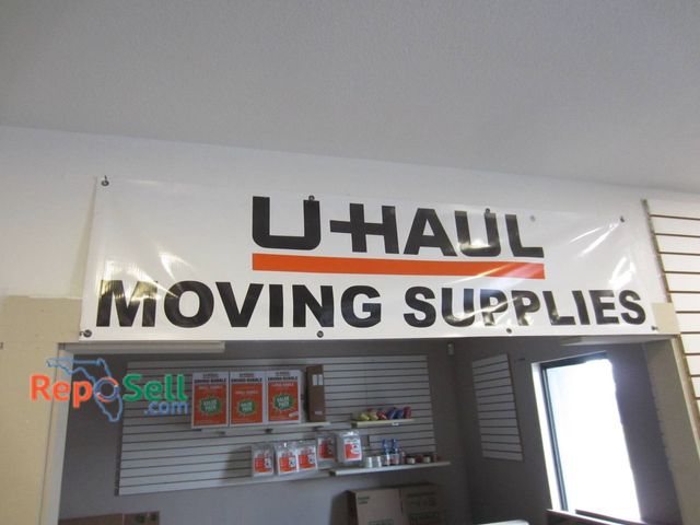 Lot 31-1380 - U-Haul Vinyl Marketing Banner Featuring 'Moving Supplies' Text. Constructed Of Durable Material With...