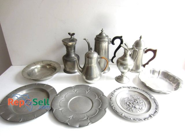 Lot 31-9248 - Pewter items, including decorative plates and pitchers. Some pieces are marked 'SKS Zinn' and 'Made ...