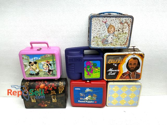Lot 31-1411 - Group of eight lunchboxes, featuring materials including metal and plastic. Themes include licensed ...