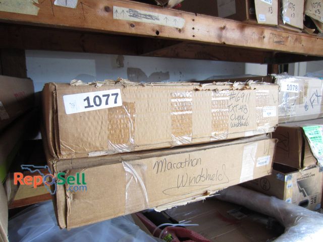 Lot 31-1077 - EZGO Marathon 86 Windshield And RedDot EZGO TXT T48 Bolt Fold Golf Cart Windshields