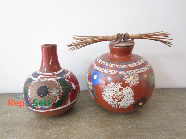 Lot 31-9124 - Two Hand-Painted Ceramic Vessels Featuring Colorful Floral And Bird Designs.