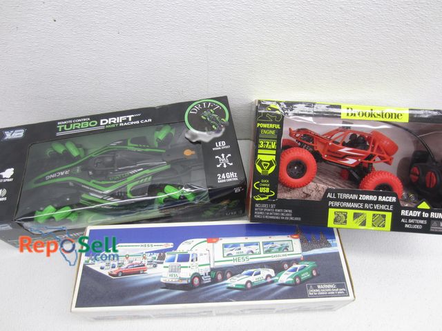 Lot 31-1080 - (2) Remote Control Cars: All Terrain Zorro Racer, Turbo Drift Mist Racing Car, (1) Hess Toy Truck &a...