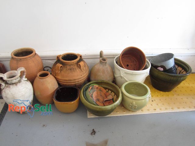 Lot 31-9140 - Garden planters, including terracotta pots, ceramic vessels, and metal containers. Largest items mea...