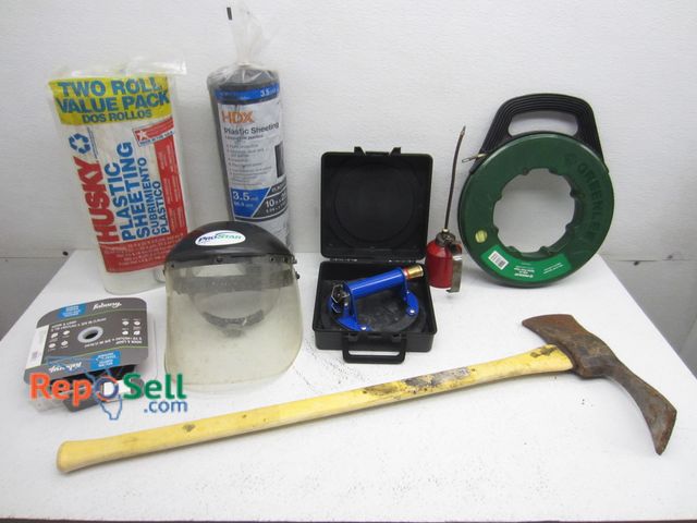 Lot 31-9393 - Tool Lot: Pick Axe, Welding Mask, Greenlee Fish Tape, etc.