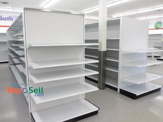 Lot 31-3064 - (2) Rows Double Sided Madix Peg Board w/(4) End Caps 22" Deep Shelves. Buyer Must Disassemble &amp; ...