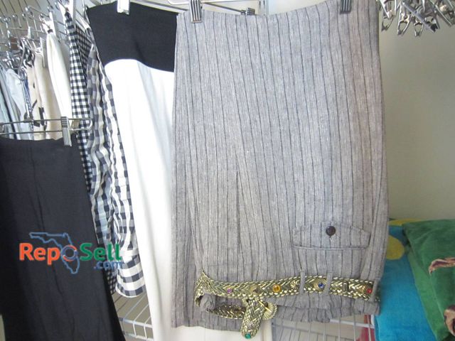 Lot 31-9133 - Twenty Four Women's Slacks: Various Sizes and Fabrics, Striped And Solid Designs With Belt.