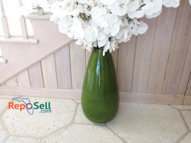 Lot 31-1086 - Large Green Plastic Vase w/White Flowers, Total Height 55"