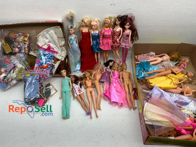 Lot 31-1415 - Approximately 20 Barbie dolls in mixed conditions, including various styles and outfits. Includes ad...