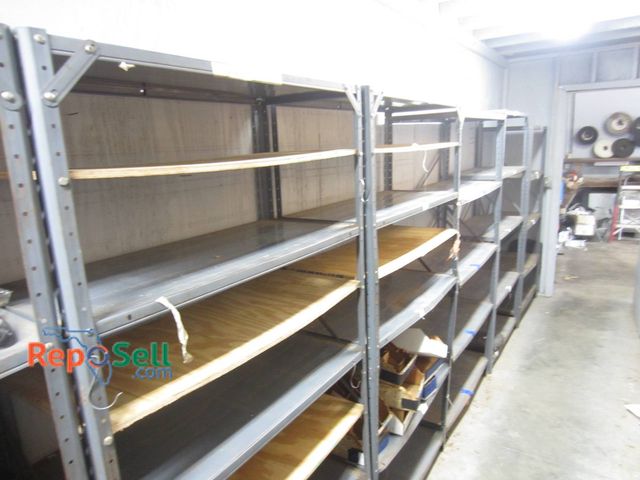 Lot 31-1267 - Five Metal Shelving Units Featuring Steel Frames And Shelves With Wooden Inserts. Each Unit Is Adjus...