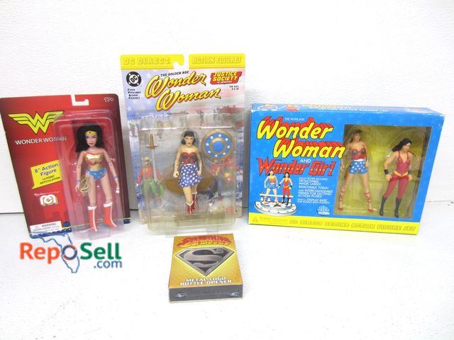 Lot 31-1244 - (3) Wonder Woman action figures, assorted sizes, and (1) Superman metal logo bottle opener.