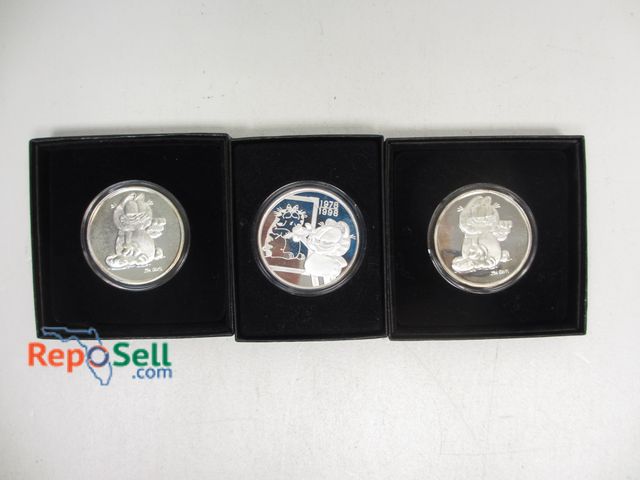 Lot 31-9016 - (3) Garfield Collectible Coins - .999 Silver 1 oz. each