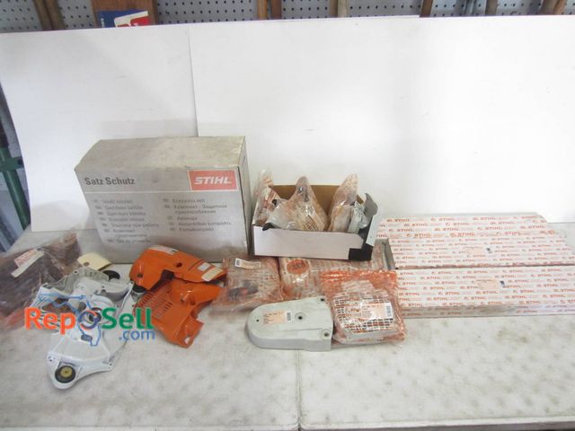 Lot 31-1243 - Stihl Chainsaw Parts, Accessories, And Assemblies. Items Feature Original Packaging And Boxed Compon...