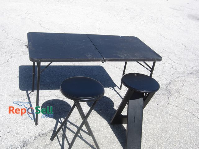 Lot 31-4192 - Black 4' Folding Table w/(2) Folding Chairs - Table Height is Adjustable