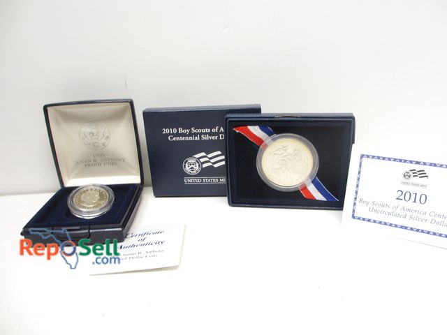 Lot 31-4005 - (2) 90% Silver Dollars with COA and Box : 2010 Boy Scouts UNC  and 1999 Susan B Anthony