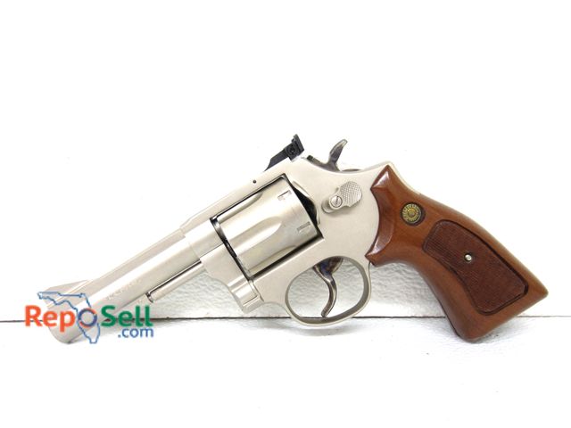 Lot 31-2455 - Taurus Model M83 .38 Special 4" Barrel 6-Shot Cylinder with Zippered case and manual.