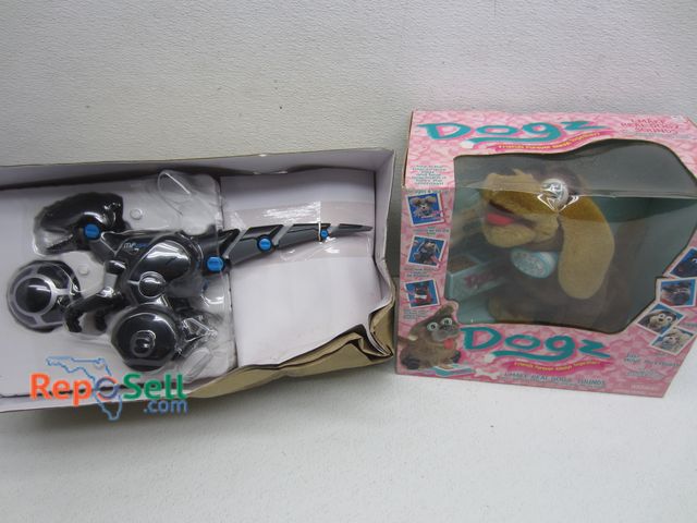 Lot 31-8406 - MiPosaur Robot Dinosaur &amp; Kids Dogz Toy - Both Appear New