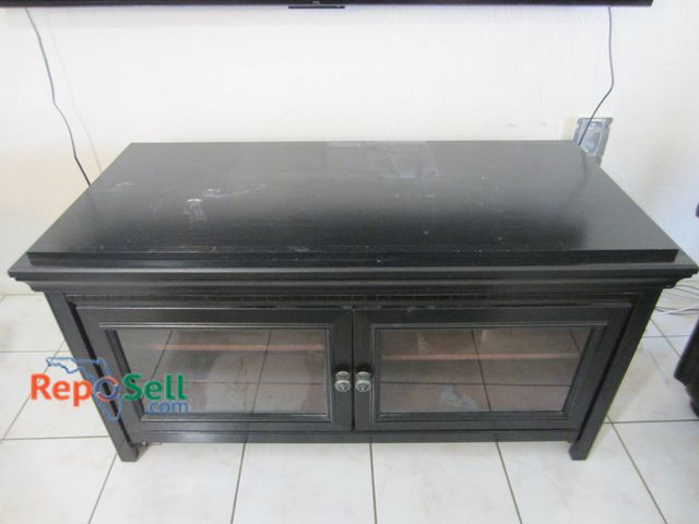 Lot 31-8655 - Black Wood TV Stand With Glass Doors, 48"x24"x23.5"