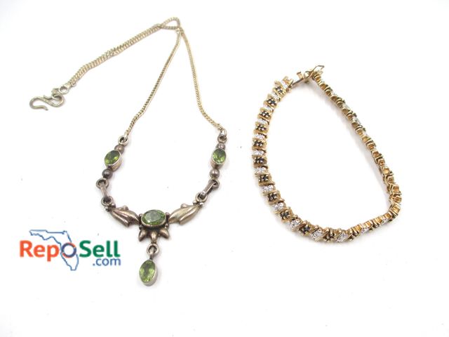 Lot 31-9017 - .925 Silver Jewelry: 7-inch sapphire bracelet, 15.3 g total and emerald 14-inch necklace, 9.7 g tota...