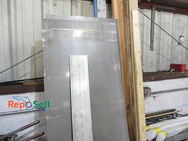 Lot 31-8329 - Lot of Stainless Steel and Wood Pieces: (2) SS 76" x 27W, .250 x 6.0, etc.