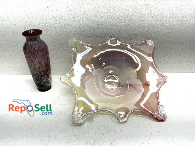 Lot 31-1402 - Art glass serving dish featuring a scalloped, asymmetrical rim with an iridescent finish in soft pin...