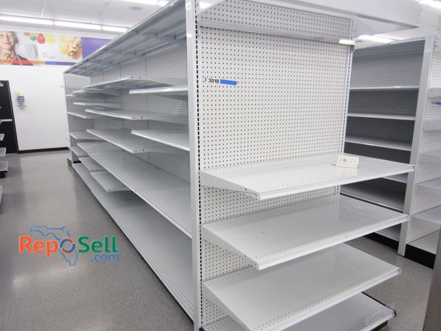 Lot 31-3018 - (1) Retail Shelving, 20' Double Sided, Plus End Caps. 25" Deep Shelves. Buyer Must Disassemble &amp;...