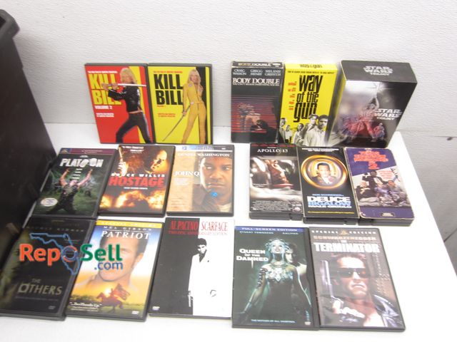 Lot 31-9497 - Lot Of (18) VHS Movies And Many DVD's: Texas Chainsaw, Kill Bill, Scarface, Terminator etc