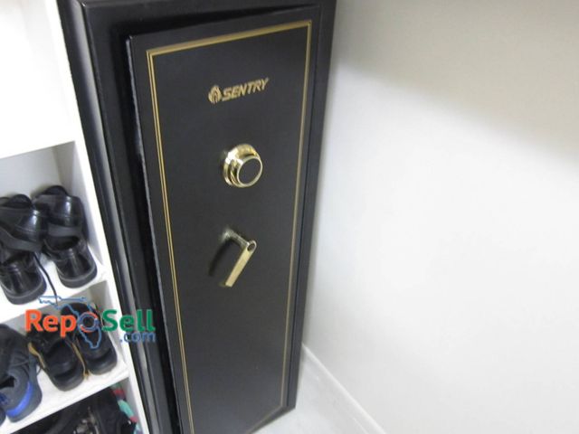 Lot 31-8621 - Sentry Gun Safe 60"H x 21 x 16 - Combo will be provided - Buyer must remove from floor