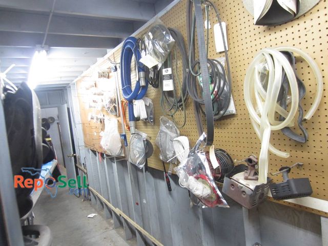Lot 31-1266 - Contents of Pegboard Wall (not including pegboard): Belts, Hoses, Coils, And Packaged Components Suc...