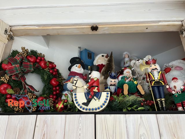 Lot 31-3011 - Large Lot of Christmas Decor: Wreath, Figures, Placemats, etc. - Bring Totes - Need Step Stool to re...