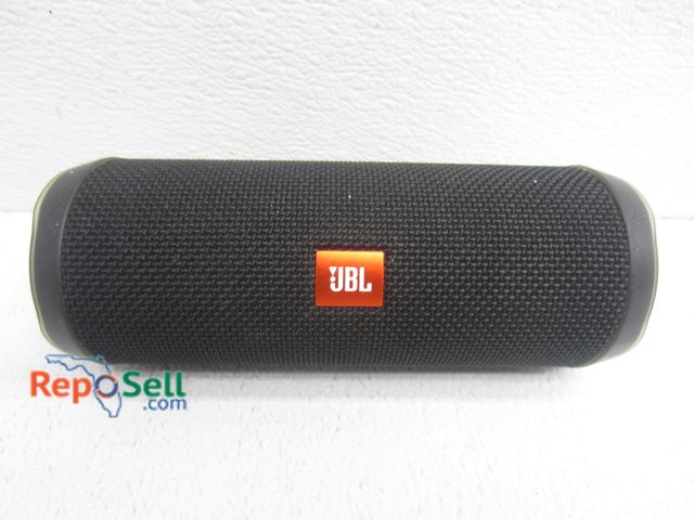 Lot 31-8489 - Small JBL Flip 4 Speaker - Powers On/Plays