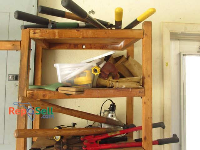 Lot 31-8365 - Hand Tools Lot Including Pruners, Pipe Wrench, Bolt Cutters, and Machete