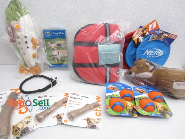 Lot 31-2303 - (12) Assorted Dog Toys, Nerf Frisbee, Chuck-It Balls, Pet Stage Dogwood Bones, Life Jacket, etc.
