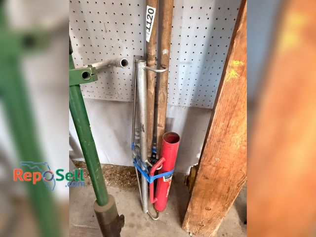 Lot 31-1120 - A Fence Stretcher, Post Hole Digger, And Fence Post Driver. The Fence Stretcher Is Constructed With ...