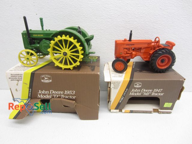 Lot 31-9377 - (2) New ERTL John Deere Tractors With Original Boxes: 1947 Model "M" And 1953 Model "D"