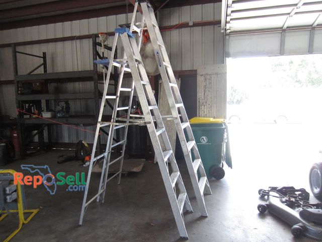 Lot 31-1047 - (2) Aluminum A-frame ladders, 10 ft and 12 ft.
