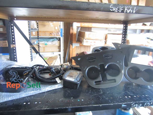 Lot 31-1171 - Contents Of Shelf: ICON Digital Dash, Wiring Harnesses, Golf Cart Dash Panels, Cupholders, etc.