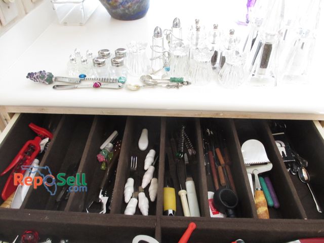 Lot 31-1193 - Misc Kitchen Items: Salt &amp; Peppers Shakers, Ice Cream Scoopers, Wine Stoppers, Cheese Knives, et...